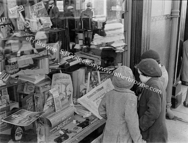 CHILDREN AT SHOP WINDOW  CONNACHT TRIBUNE